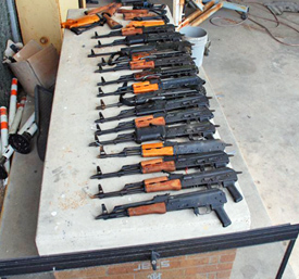15 AK 47 assault type rifles that were discovered hidden inside a pickup truck