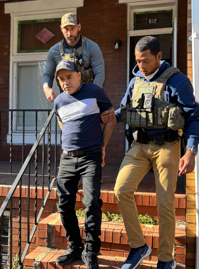 Federal law enforcement officials locate and arrest an illegal alien during an enhanced enforcement operation Jan. 29 in Baltimore.