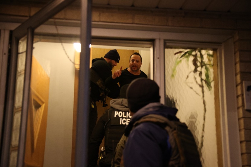 ICE and its federal law enforcement partners from the ATF, DEA and FBI take an illegal alien into custody during an enhanced law enforcement operation in Chicago Jan. 25.