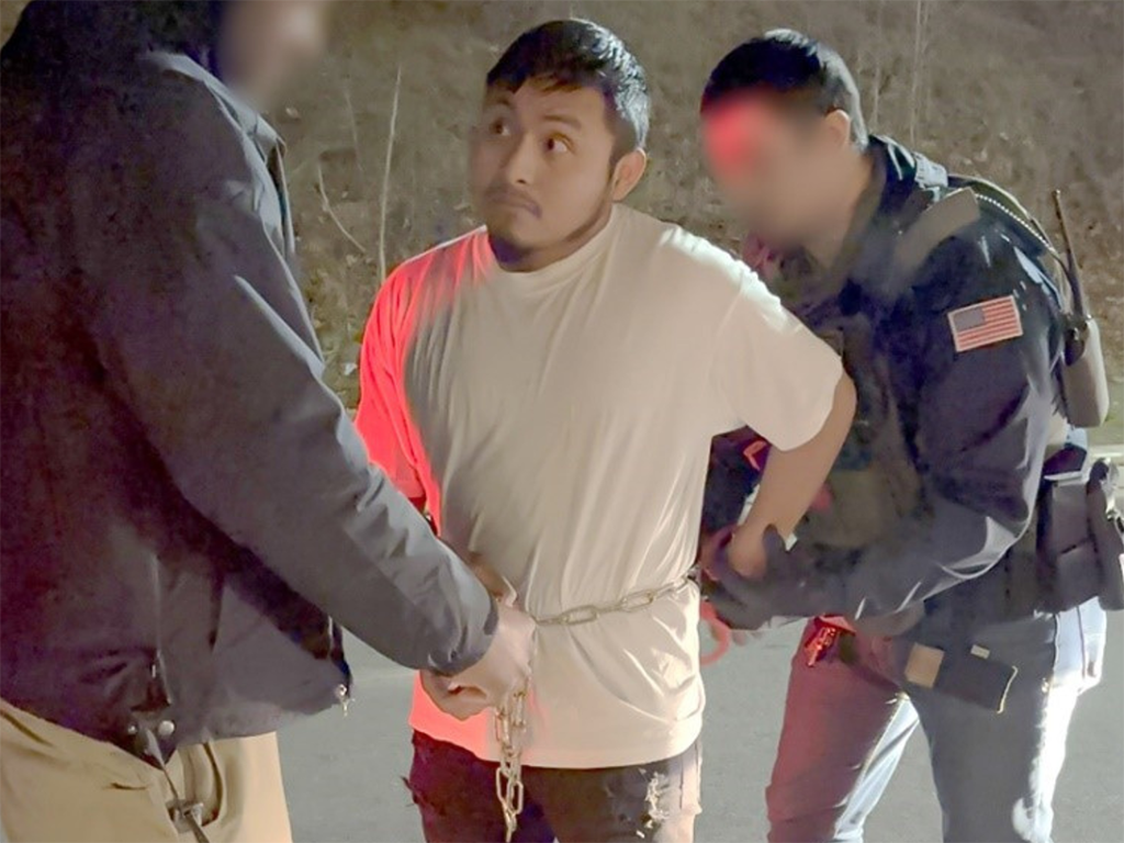 U.S. Immigration and Customs Enforcement officers arrest an undocumented Guatemalan alien charged with trespassing and possessing a loaded handgun and ammunition in the Baltimore area Feb. 1. The arrest was part of a routine daily operation for Baltimore’s ICE officials, who arrested this alien after local officials declined to honor an immigration detainer.