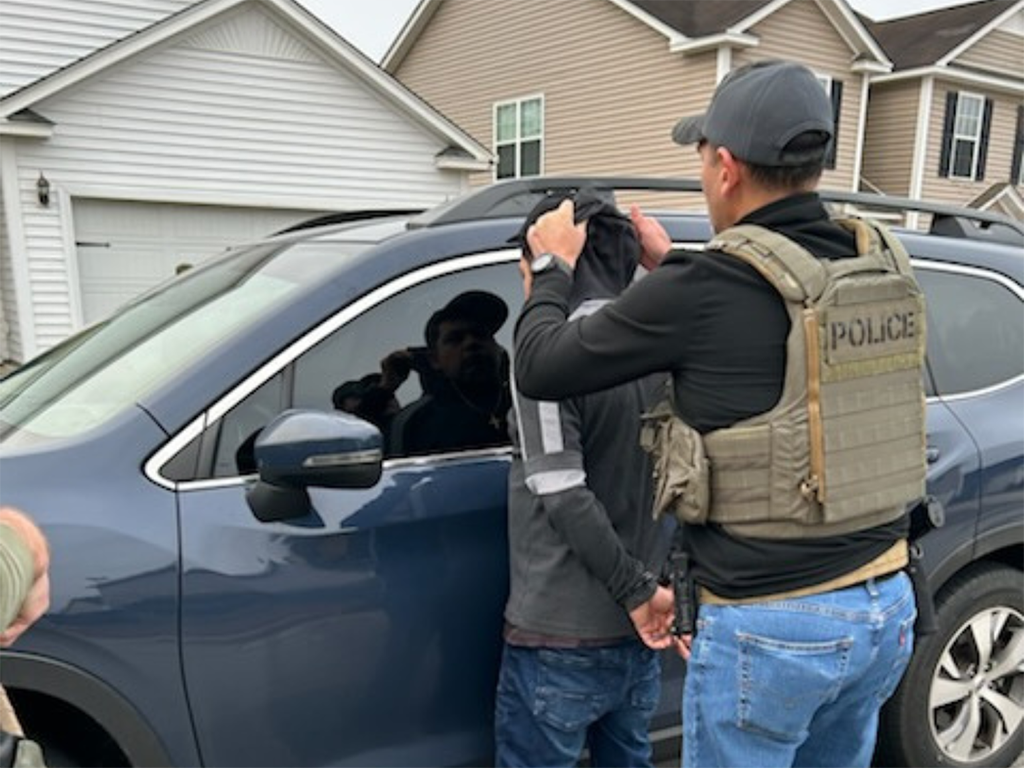 An ICE official arrests a Tren de Aragua gang member in Charleston, South Carolina, Feb. 3 during a routine daily operation.