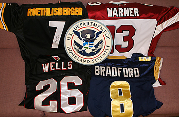 Four of the counterfeit NFL jerseys seized by ICE in Phoenix