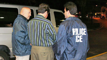 Richard Sinclair Pope in the custody of two ICE agents