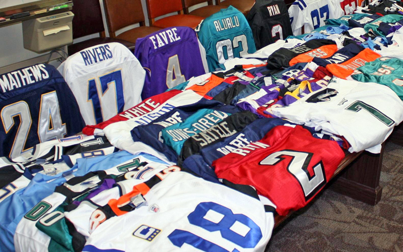  ICE seizes more than $40,000 worth of fake NFL apparel (pictured) at area swap meets