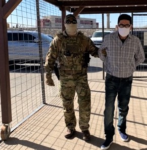 Members of the ERO El Paso Special Response Team escort Juan Jose Bernabe Ramirez, 62, to the U.S.-Mexico international boundary at the Paso del Norte Bridge where he was turned over to the custody of Mexican authorities. 